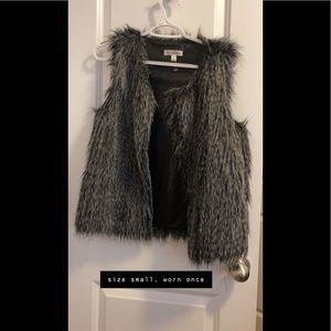 black and white fur vest